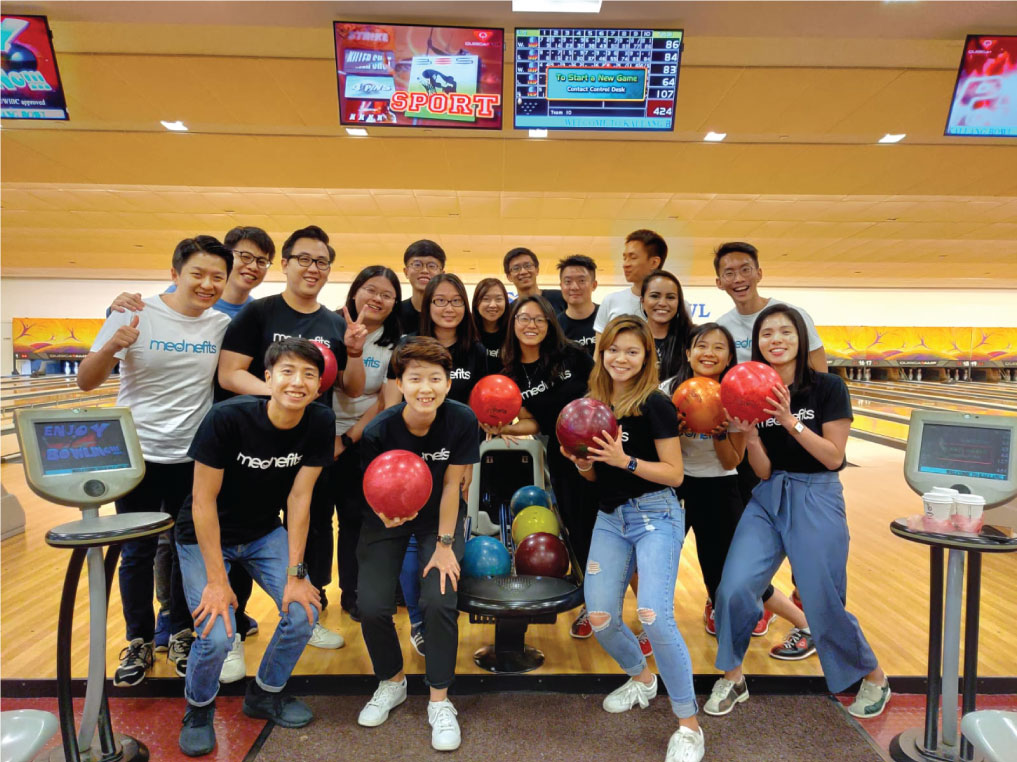 Group photo at a bowling alley